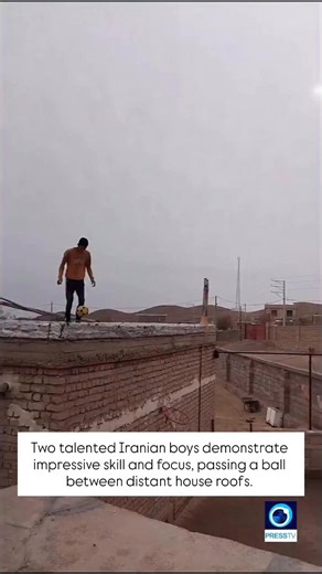 ⚽️ Two talented Iranian boys show off impressive football skills and focus, passing a ball between distant rooftops with absolute precision. Presstv Programs | Presstv Programs