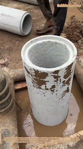 Pose de tuyaux en béton : raccordement de tuyaux de drainage de grand diamètre