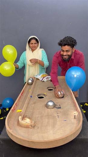 Sister vs brother best steel ball roll and pop balloon game #shorts