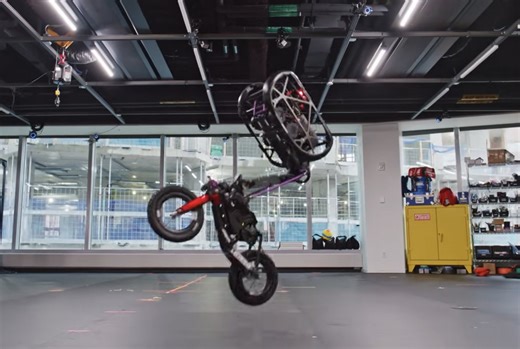 Simply built bicycle robot shows jumps and tricks