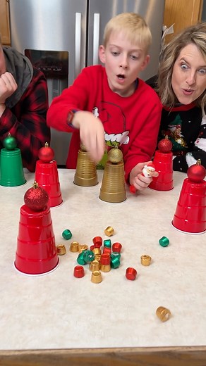 What's Under the Cup -- Family Game 🥤 Mom, Dad, and family play a fun Christmas cup roulette with some awesome prizes. Fun idea for Holiday gatherings. This video was produced by Peter B, Network Media, and Benson Bros. (for entertainment) | Paul & Kezzy