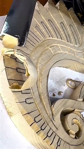 Detailed Wood Carving Process Creating Curved Relief Patterns by Hand Tools