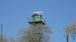 Radar control tower . Aviation radar. Surveillance radar system, coastline, border, command and control system over the tops of trees.