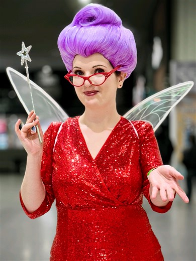 Fairy Godmother cosplay from the Shrek 2 movie, filmed at Megacon Live London 2026 by Comic Con News Shrek 5 is the long awaited sequel in the beloved Shrek animated franchise. The film is officially in production and is currently scheduled to arrive in cinemas on June 30, 2027. Mike Myers returns as Shrek, Eddie Murphy reprises his role as Donkey, and Cameron Diaz is back as Princess Fiona, reuniting the original voice cast that helped make the franchise a global animated phenomenon. cosplayer 