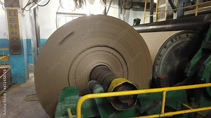 conveyor of a paper-making machine at a paper factory in the production of technical paper for packaging and electrical engineering