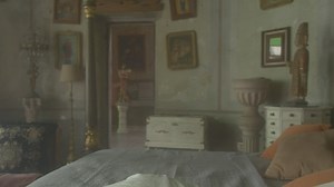 A depressed old fashioned woman laying in bed  - Free Stock Video