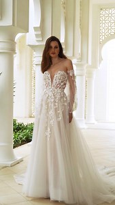 2.8K views · 81 reactions | Picture your outdoor garden wedding, made complete with the REMI gown ✨ | Enzoani | Facebook