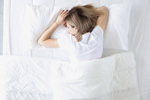 Is Sleeping on Your Stomach Bad? Here's What Experts Say About It