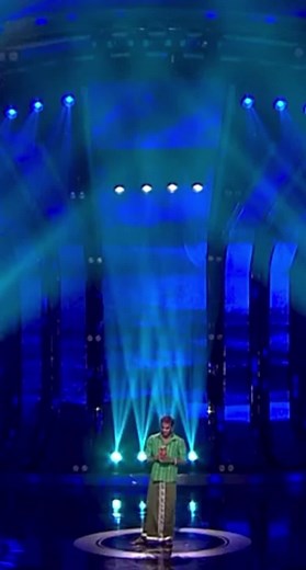 Live Performance Highlights Under Blue Stage Lighting