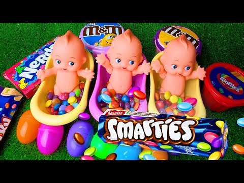 2 Minutes Satisfying ASMR Video🍬Smarties & Surprise Eggs Candy Challenge in Bathtubs
