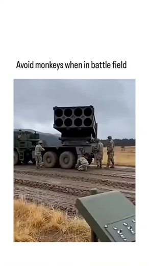 reel fountain on Instagram: "The post shares a 10-second video clip showing soldiers preparing a multiple rocket launcher in a field, where a monkey climbs onto the control panel and appears to trigger an accidental launch, prompting panic and evacuation amid smoke and fire. Captioned in Pidgin English ("Avoid monkeys when in battle field E get why"), it humorously warns of wildlife risks in combat zones, garnering over 90,000 views and mixed reactions including laughter and claims of AI fabrica