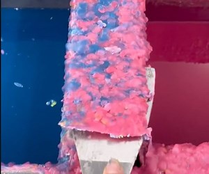 Scraping Candle Wax off of a Dip Tank Is So Damned Satisfying