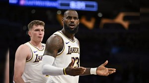 LeBron James sparks backlash after golf swing gesture during national anthem