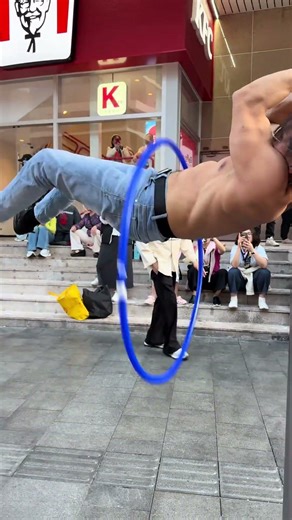 Title: Masterful Waist-whirl: Crow Brother's Hula Hoop Showdown