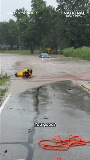 Firefighters stepped in to help rescue a baby deer stuck in floodwaters