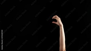 Hand showing letter C on dark background. Sign language alphabet