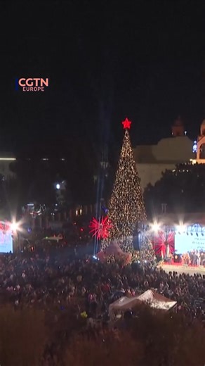 A giant Christmas tree was lit up in Bethlehem’s Manger Square, between the Church of the Nativity and a mosque adorned with lights. Celebrations are returning to their full festivities this year after a more somber mood during the conflict in Gaza. Bethlehem residents say the return of celebrations marks an important step toward a brighter future. #BethlehemChristmas #MangerSquare #ChristmasHope #HolyLand #PalestineLights | CGTNEurope