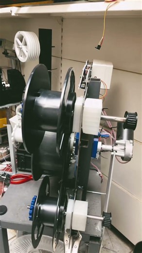 Filament line retrofit for multi-spool winders roll change from 0.5 kg to 6 kg without stopping