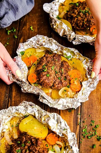 234K views · 2.6K reactions | These hobo foil packets are hearty, easy, and pure campfire (or oven!) comfort—juicy meat, tender veggies, and simple seasoning all wrapped up and cooked to perfection. Zero cleanup, big flavor, and fun for the whole crew to customize. https://thestayathomechef.com/hobo-foil-packets/ | The Stay At Home Chef | Facebook