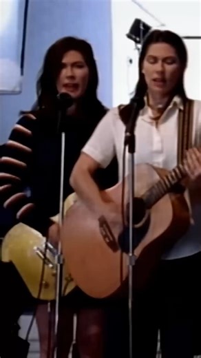 Kelley Deal of The Breeders Sweater | "I didn't really play guitar when I joined [The Breeders]. How's that for imposter syndrome?" Kelley Deal said. "But Kim and I had been singing together since we were eight. A lot of the songs that ended up on [our debut] Pod are variations of songs that we'd written in the bedroom, so that helped me. Otherwise, I didn't care that I couldn't play. The emotional element has very little to do with being able to play scales really fast." Kelley Deal wore this v