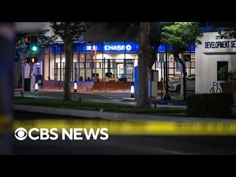 California officials brief on bank hostage situation after suspect is shot and killed | CBS News