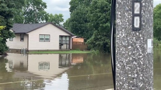 The scene of a flooded 107th Street and Silver Spring Drive in Milwaukee on Sunday after historic rainfall slammed southeast Wisconsin. Full weather coverage here: https://tinyurl.com/milwaukeeweatherfloods | Milwaukee Journal Sentinel