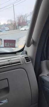 Exiting the highway then right at light with an island