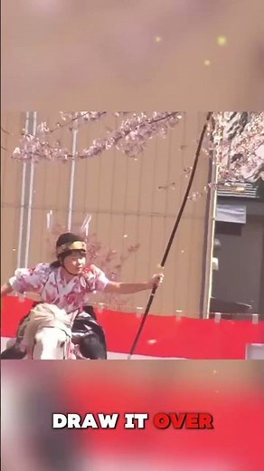 This shows kyūdō, traditional Japanese archery, performed with a yumi