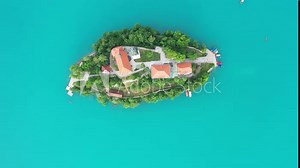 lake bled drone aerial Pilgrimage Church of the Assumption of Mary In . Bled Island In Slovenia With bled Castle Museum On Precipice And Rocky Mountain 4k Footage raw summer Virgin Mary