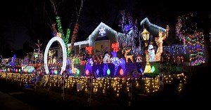 Shining a light on giving: Candy Cane Lane now open for the season