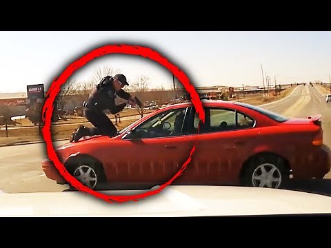 Police Officer Hangs Onto Fleeing Suspect’s Car Hood