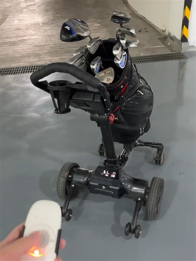 Carry the Bag? Leave It to the Caddie​. 3 steps: insert battery → unfold → choose mode (remote/follow). Now your bag follows you the whole round—walks when you walk, stops when you stop. 👉 Share with your golf crew—no more carrying! #golf #golftech #GolfLife #golfing #golfcaddy #golfers #golfcart #AutoFollowCaddy #Americanwarehouse #Germanwarehouse