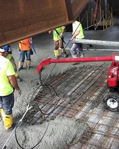 Line Dragon for the win here. Remote operation and control speeding up the concrete pump process for large pours. There is a 2nd Line Dragon out of the video that strickly moves the hose to keep it out of the way. Claims of 50 - 60% increase in production for large pours. Powered by a Honda GX390 13 horsepower gasoline engine Remote control operation over rebar reinforcement, radiant heat lines, floor decking or other prepared surfaces, forwards, backwards, left, right or oblique Placing boom sw