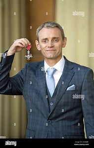 David Banner after receiving his Member of the Order of the British Empire (MBE) medal for services to the video games industry in an Investiture ceremony at Buckingham Palace, London Stock Photo - Alamy