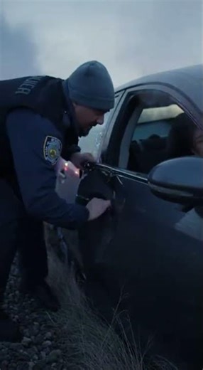 Police Officer Saves Woman from Crashed Car