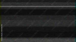 Interference with television broadcast on the screen with a grainy interrupt and grey noise 4k