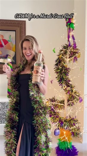 GRWM for a Mardi Gras ball with my sponsor @Tito's Handmade Vodka ! Nothing better than a smooth dirty martini to start the night!! #titosvodka #mardigras Tito’s Dirty Martini: 1 oz Tito’s Handmade Vodka 2 oz olive brine Splash of vermouth Shake over ice and pour into martini glass with 3 olives as a garnish