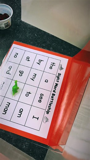 Sight Word Battleship was a HUGE win last week and I can’t wait to watch them play again. I just put our sight words on a grid in @Canva and then put a privacy board in between the papers! We used bingo chips and dinosaurs to mark their misses and “battleships” because I have some major dinosaur lovers this year 😍. You wouldn’t even need to put them on the bigger colored paper. Just print, and put two papers in between the privacy boards! #kindergarten
