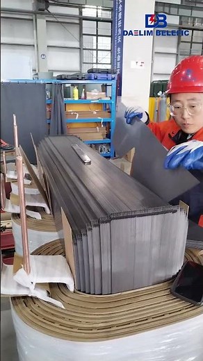 Assembling the Upper Yoke with Silicon Steel Laminations