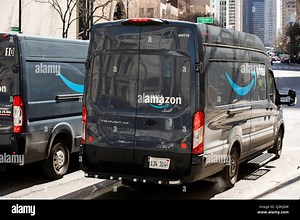 Chicago, Illinois, USA - March 27, 2022: An Amazon Prime van makes a delivery in the city Stock Photo - Alamy