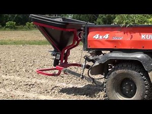 UTV Hitchworks - Kubota 900 with our Farmboy carrying a FIMCO Industries fertilizer spreader