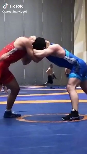 Exciting Wrestling Match Highlight: Red vs. Blue Singlet