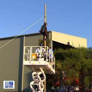 16K views · 147 reactions | A 23-year-old climate activist has been arrested, after suspending himself from a pole 10-metres above a main road in #Sydney. The protestor caused heavy traffic delays this morning, after blocking the entrance to #PortBotany. Police had to remove the man using a cherry picker and deemed his actions "unfair". Full story tonight on #9News | 9 News Sydney | Facebook
