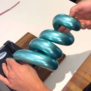 1.3M views · 735 reactions | This magician makes incredible chrome balloon art.  | Culture Insider | Facebook