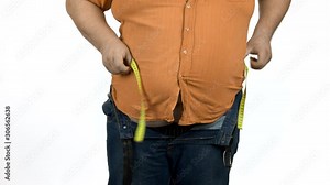 Fat man check his body with a measuring tape. Weight loss control. Lets start a new life.