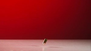 Download Bullets falling and bouncing in ultra slow motion 1,500 fps on a reflective surface - BULLETS PHANTOM 019 for free