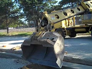 Landmark Contracters: Gradall xl 4100 making space for curb