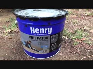 Getting ready to patch a flat roof with Henry Wet Patch