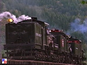 Four steam logging locomotives of the Mt. Rainier Scenic Railroad gather on the Nisqually River Trestle and sing a nice melody of steam whistles. From the Valhalla Video Productions show "Geared Triple Header" https://rfd.video/GearedTriple | Steam Giants