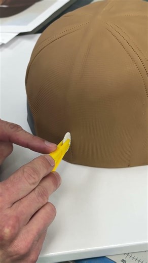 We’re making a 3D baseball hat cake! What do you think of these details? #cakedecorating #fondant